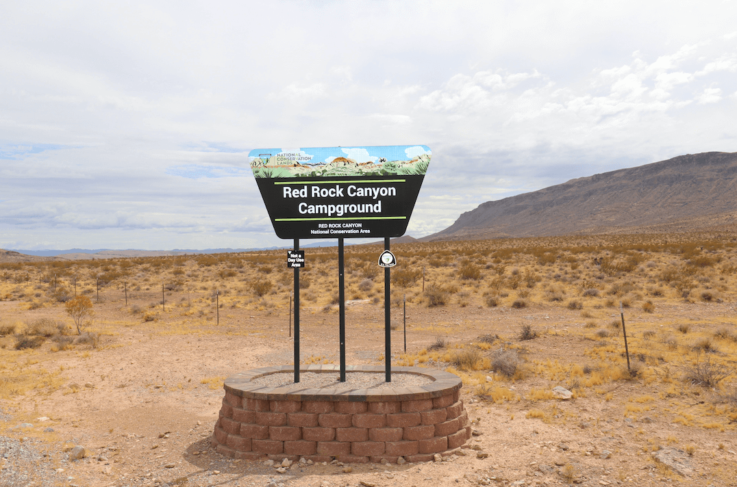 Updated Valley of Fire State Park Campsite Photos - Red Rock Canyon Sign